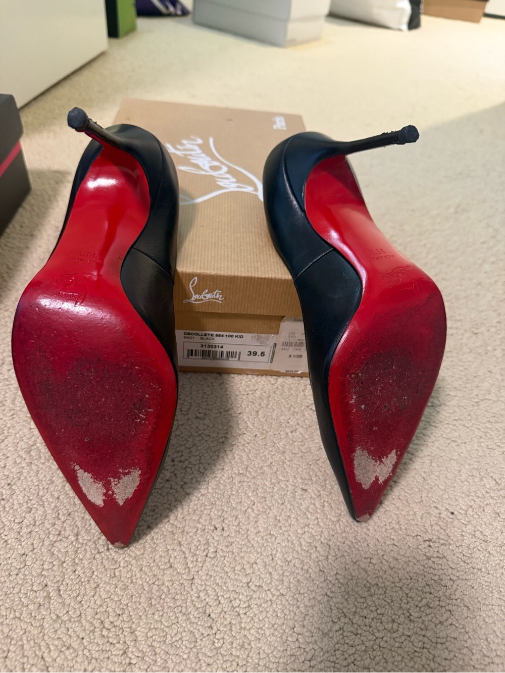 Christian Louboutin Black Leather Décolleté with Red Soles